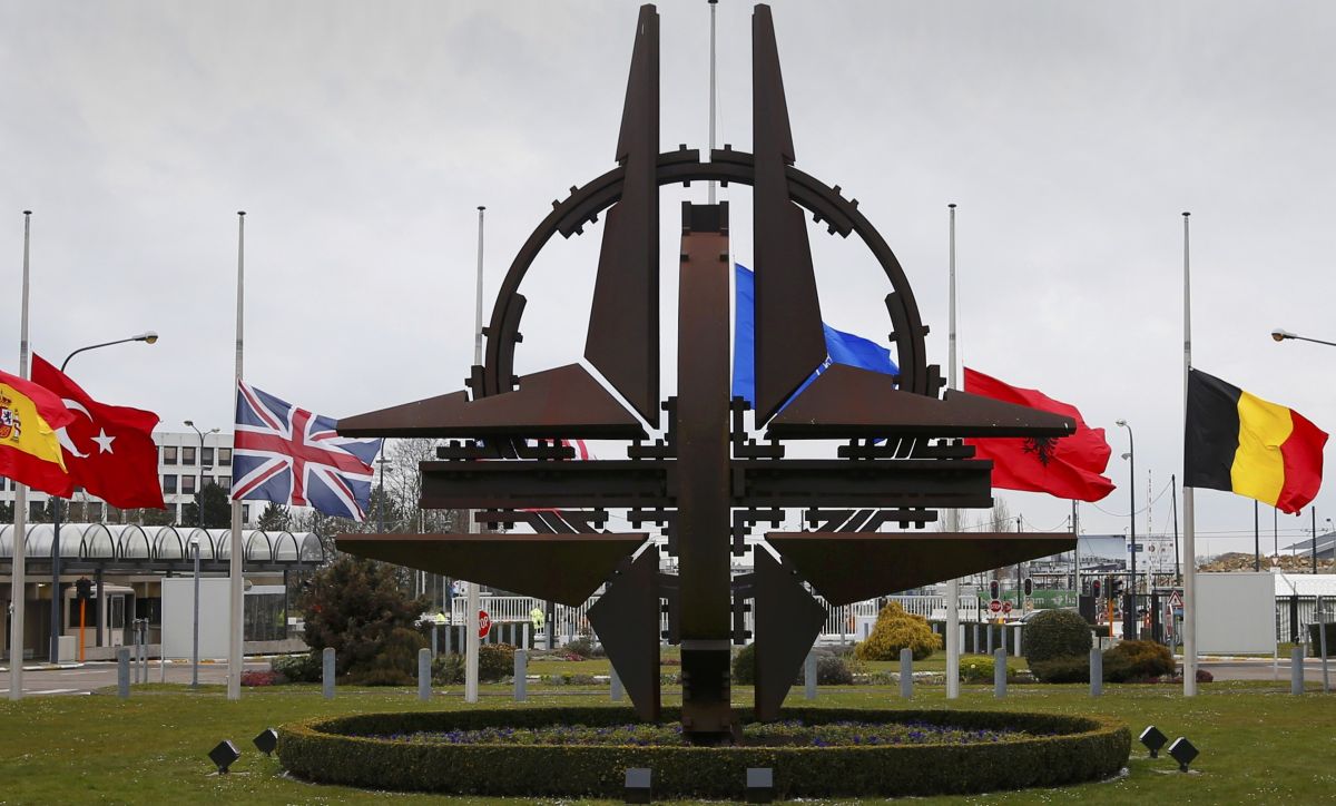 Flags fly at half mast at NATO headquarters in Brussels following Tuesday's bomb attacks in Brussels, Belgium, March 23, 2016.     REUTERS/Francois Lenoir