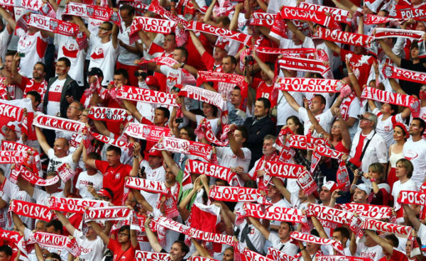 WARSAW, POLAND - JUNE 12: Polish fans show their support during the UEFA EURO 2012 group A match between Poland and Russia at The National Stadium on June 12, 2012 in Warsaw, Poland.  (Photo by Michael Steele/Getty Images)