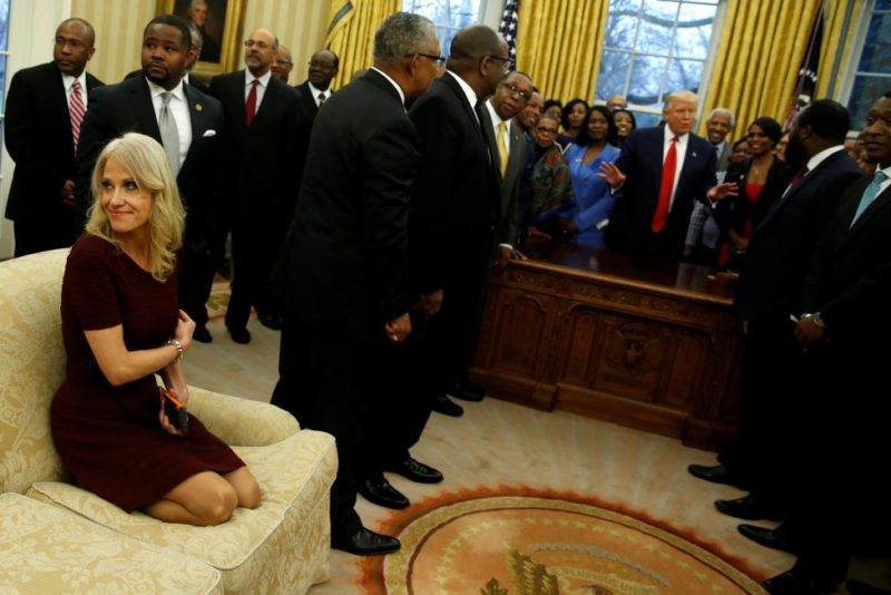 Senior advisor Kellyanne Conway sits as President Trump welcomes the leaders of dozens of historically black colleges and universities in the Oval Office. REUTERS/Jonathan Ernst